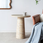 Design Republique Natural Cement Round Side Table in a room setting.