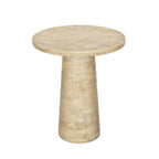 Round natural cement side table with a pedestal base and a textured travertine-look finish in a warm natural colour.