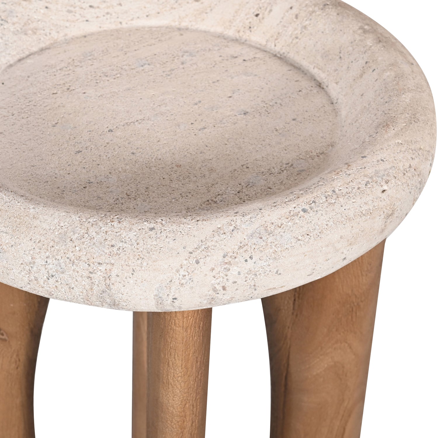Close-up of the textured natural stone top and solid wood base detailing.