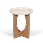Amparo Fleur stone side table with a round textured stone top and sculpted natural wood base on a white background.