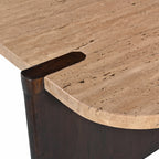 Close-up of the Carter Marble Side Table, highlighting the natural travertine marble top, rounded corners, and contrasting dark timber support detail.