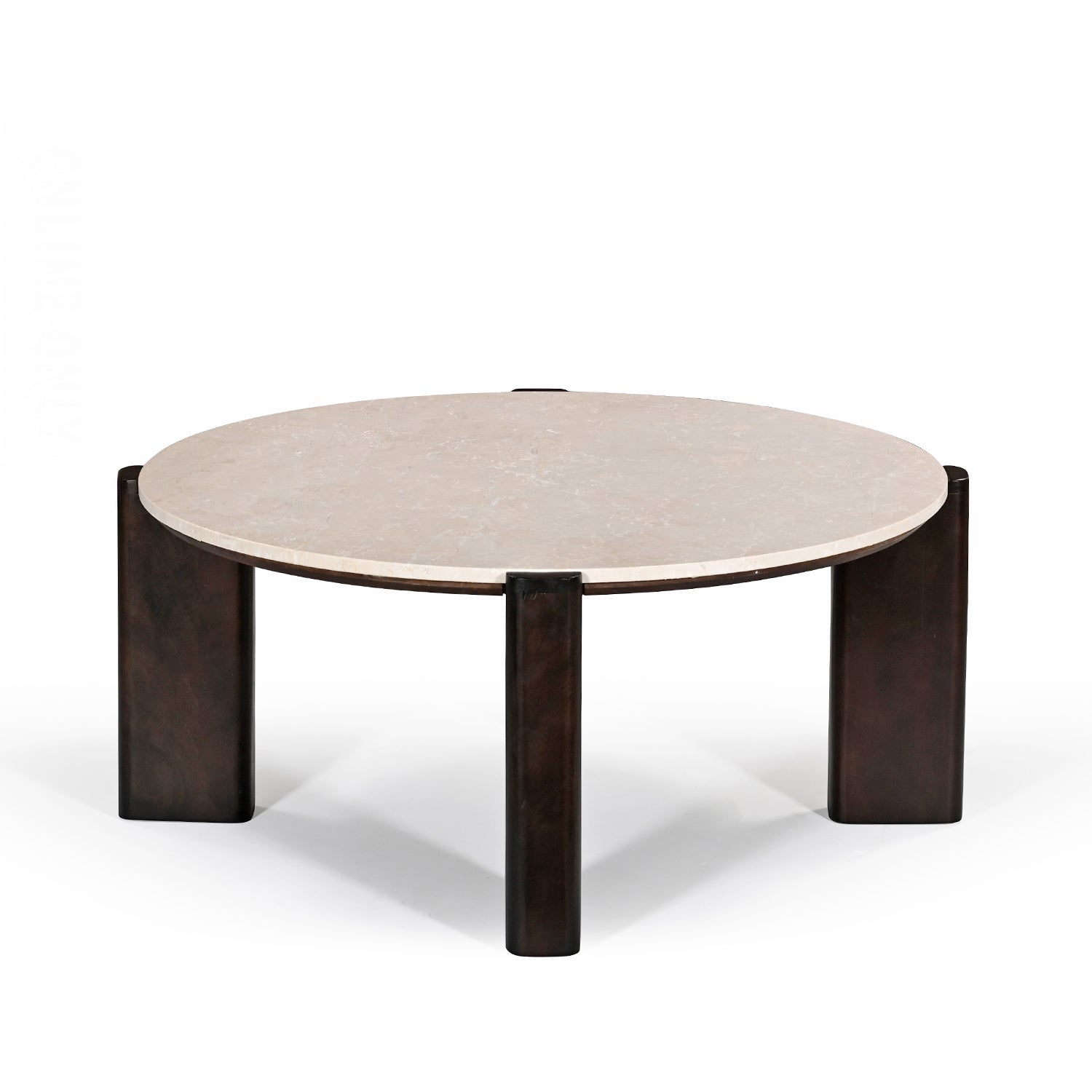 Front angled view of the round coffee table featuring a cream marble top and sculptural dark brown timber legs.