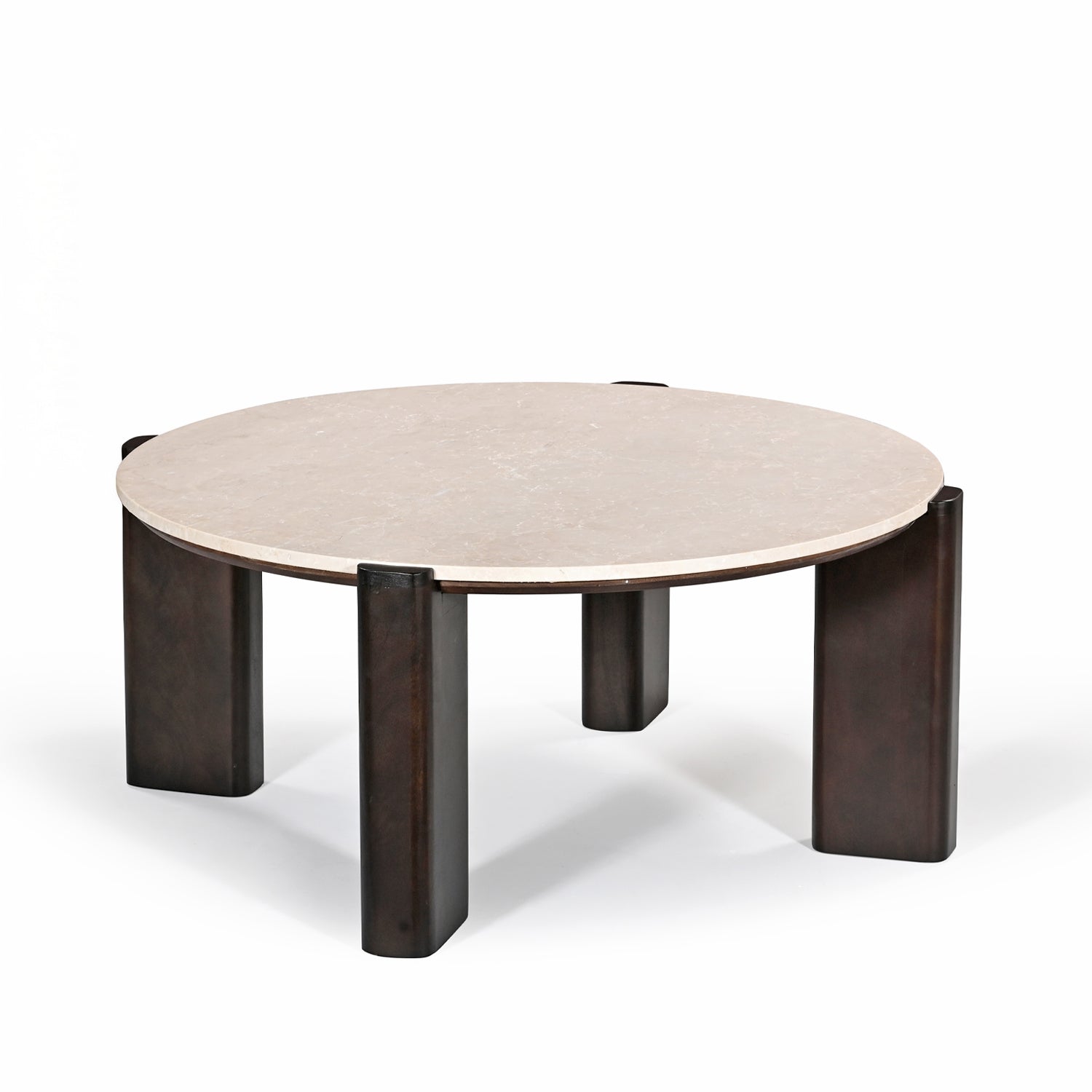 Front angled view of the round coffee table featuring a cream marble top and sculptural dark brown timber legs.