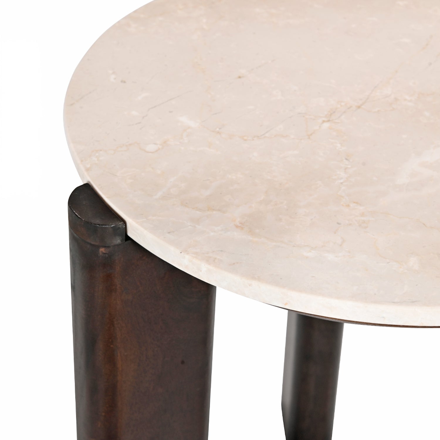 Close-up of the cream marble tabletop with subtle natural veining and a chunky dark brown timber leg detail.