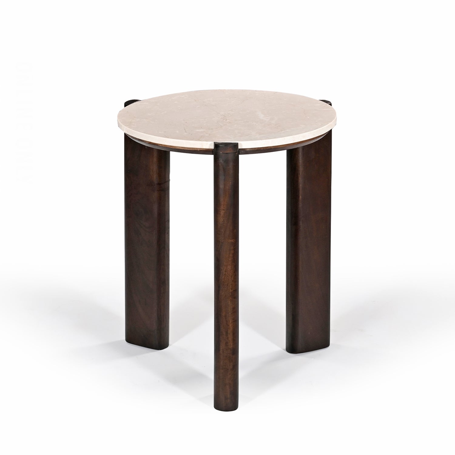 Front angled view of the round side table with a cream marble top and sculptural dark brown timber legs on a white background.