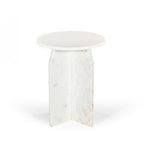 Three-quarter view of the white marble side table on a white background, displaying the sculptural base and premium marble construction.