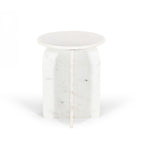 Front view of the white marble side table on a white background, highlighting the sculptural intersecting pedestal base and round marble top.