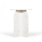 Side profile of the white marble side table on a white background, emphasising the slim round top and architectural pedestal silhouette.