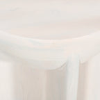 Close-up of the Amparo mango wood side table in white wood, highlighting the smooth rounded edge and subtle natural grain detail.