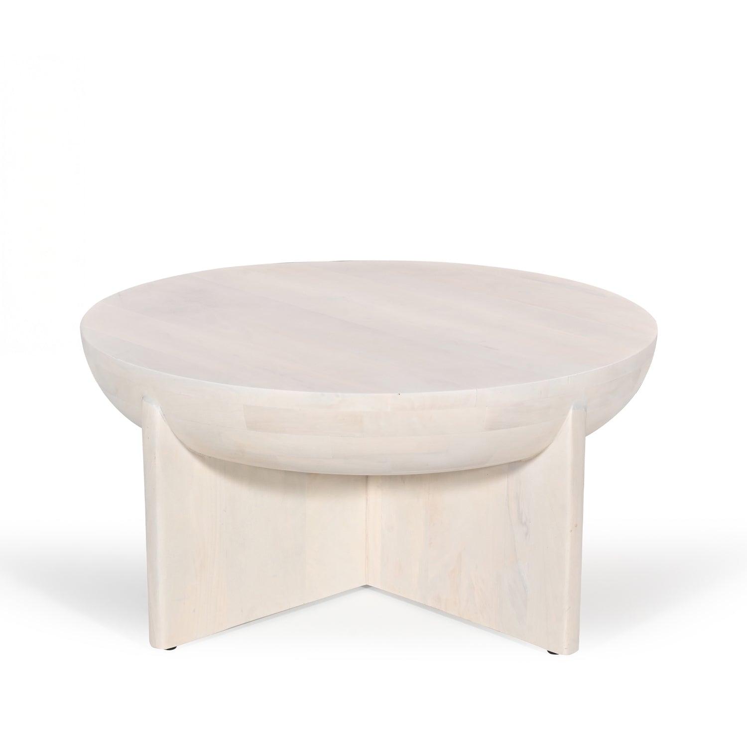 Amparo mango wood coffee table in white wood shown against a plain white background, highlighting the round tabletop and curved base design.
