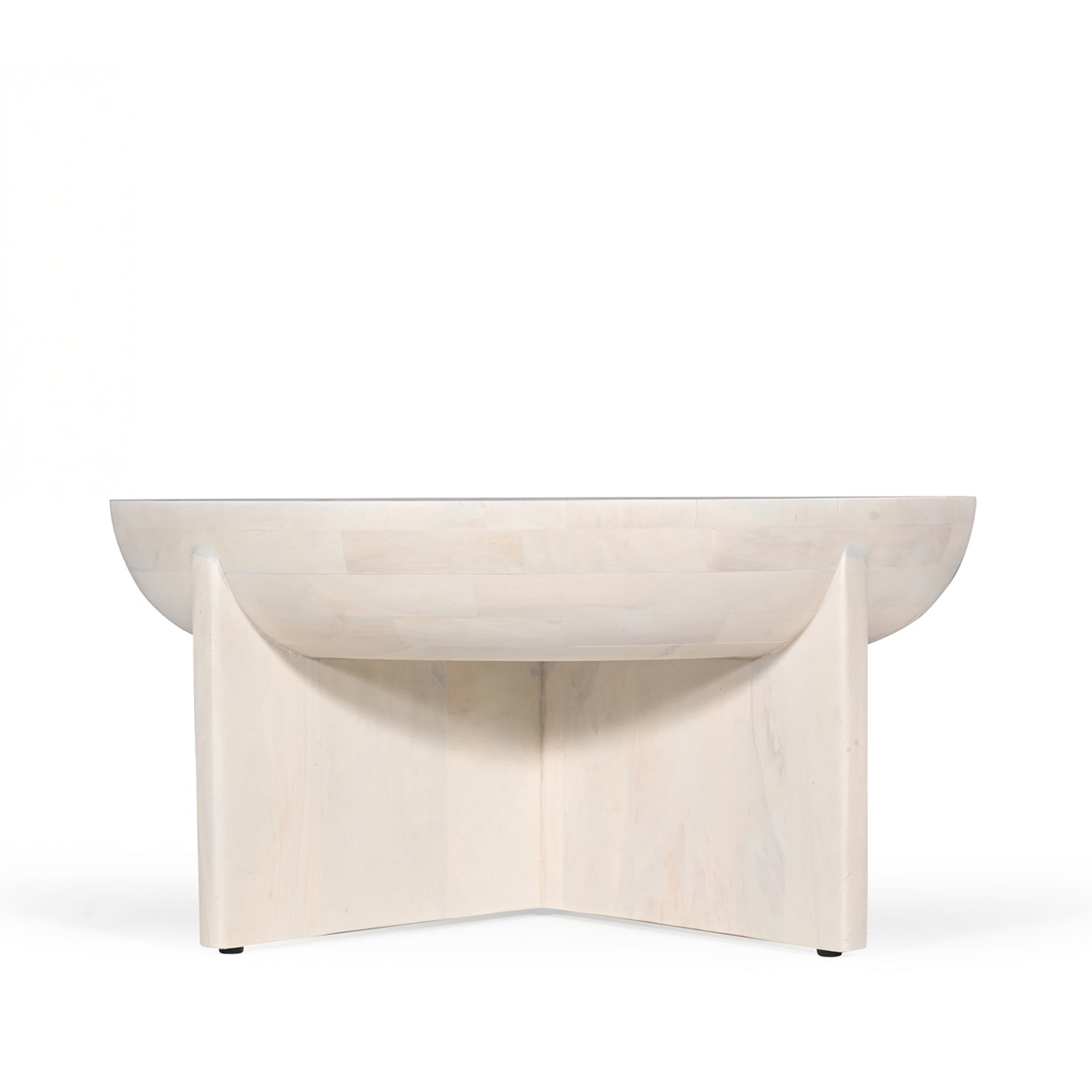 Amparo mango wood coffee table in white wood shown from the back against a plain white background, highlighting the curved base panels and rounded tabletop.