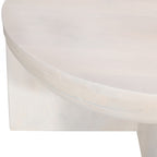Close-up of the Amparo mango wood coffee table in white wood, showing the smooth rounded edge and subtle natural grain detail.