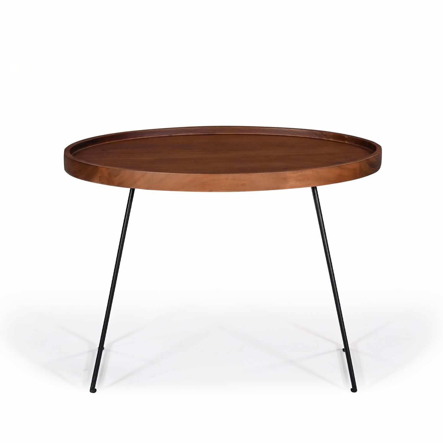 Side view of large Amparo Acacia coffee table showing slim black iron legs and wooden top.