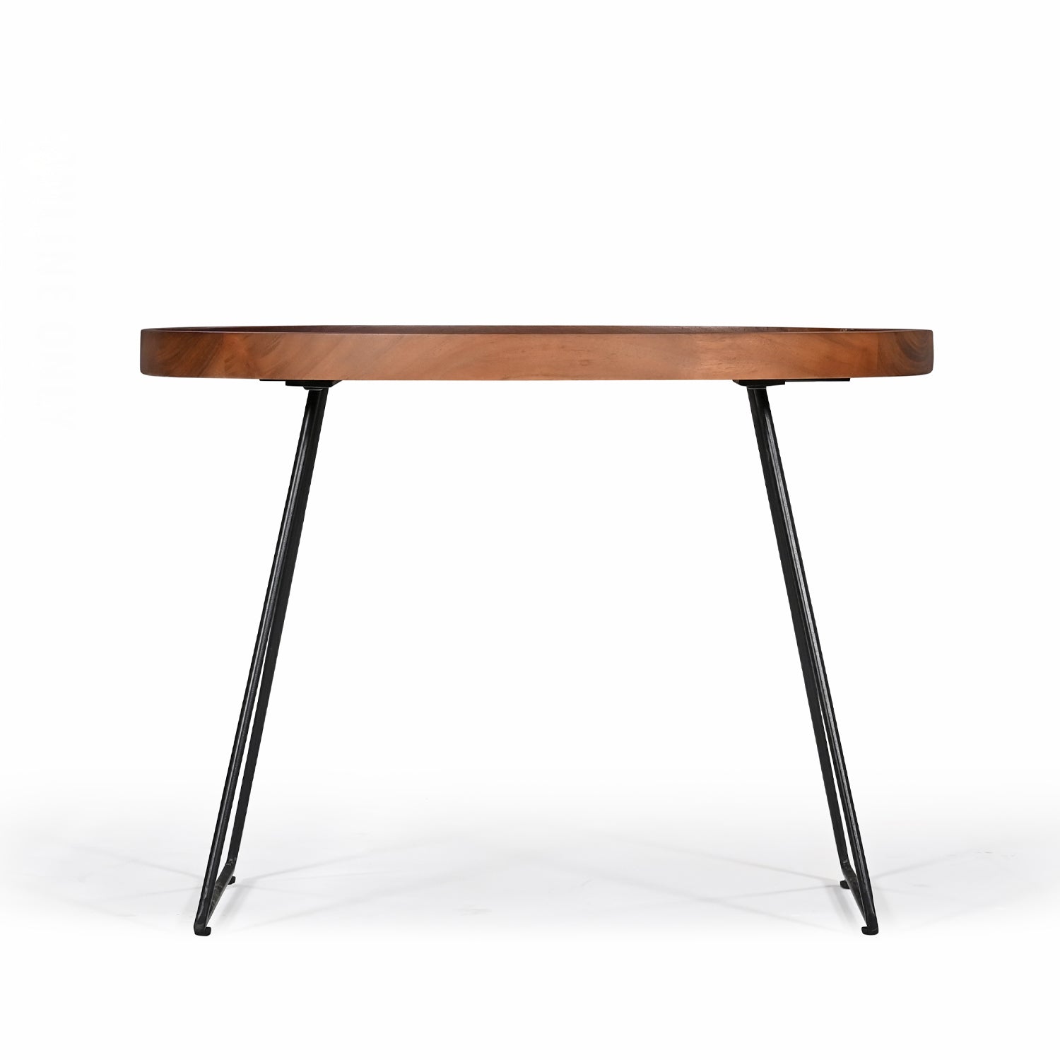 Large Amparo Acacia coffee table shown from the front with round wooden tray-style top.