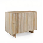Vicky sideboard in natural mango wood with slatted cupboard doors, rounded edges, and a contemporary minimalist silhouette.