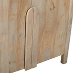 Close-up of the Mango Shona sideboard showing the sculpted curved timber door handles, natural mango wood grain, and rounded edge detailing.