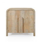 Front view of the Mango Shona sideboard in natural mango wood with double cupboard doors, sculpted curved timber handles, rounded edges, and a minimalist contemporary design.