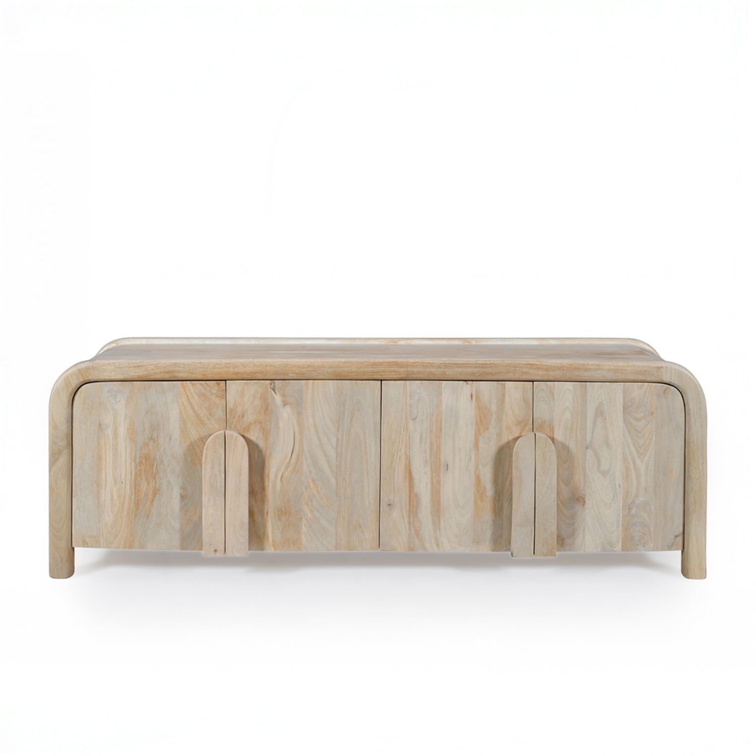 Front view of the Shona entertainment unit in natural mango wood featuring four cupboard doors, sculpted timber handles, rounded edges, and a contemporary curved design.