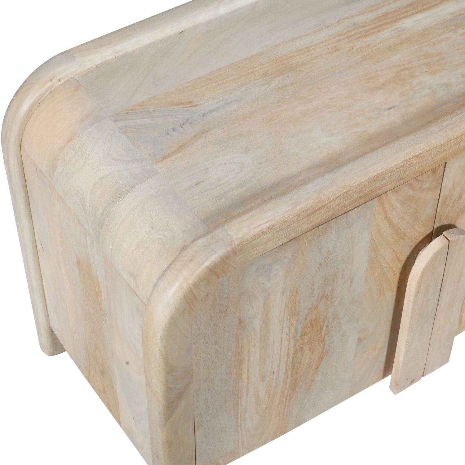 Close-up of the Shona entertainment unit highlighting the rounded corner profile, natural mango wood grain, and smooth curved edge detailing.