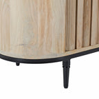 Close-up of the Amparo Mango Iron Sideboard showing the natural mango wood grain, slatted door detail and black metal leg.