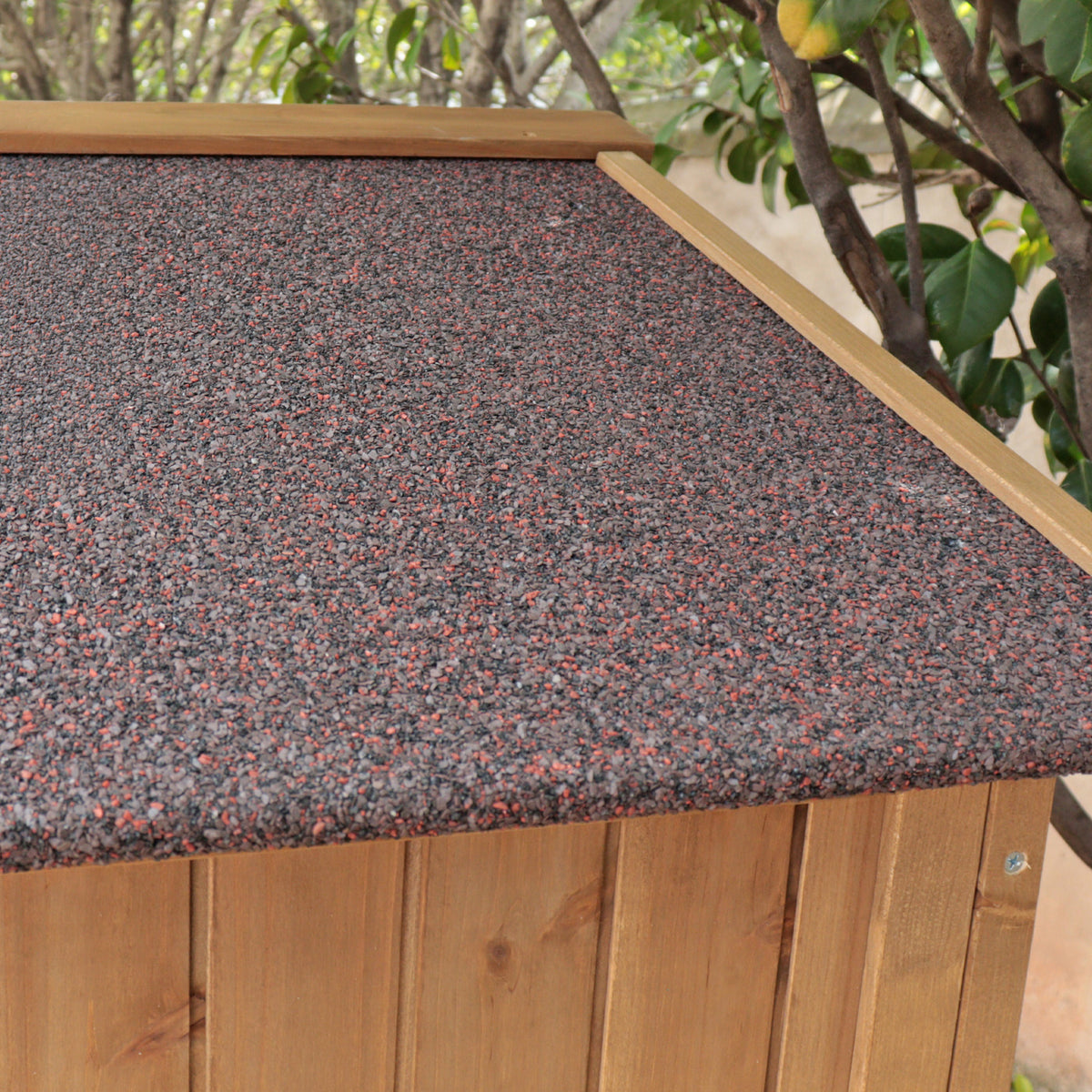 A close up of the roof on a wooden shed.