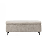 Design Republique oatmeal upholstered storage bench with a textured fabric finish and black metal legs on a white background.