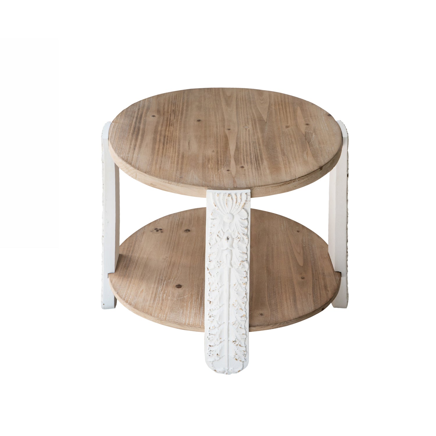 Round natural wood side table with a lower shelf and carved antique white legs featuring decorative floral detailing.