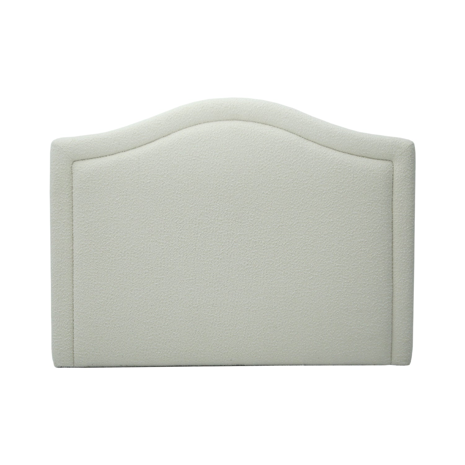 Cream bouclé upholstered headboard with a gently curved silhouette and soft textured finish, designed to add warmth and elegance to the bedroom.
