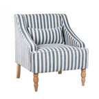 A blue and white striped upholstered accent armchair with turned wooden legs and a matching lumbar cushion offers classic coastal style and inviting comfort.