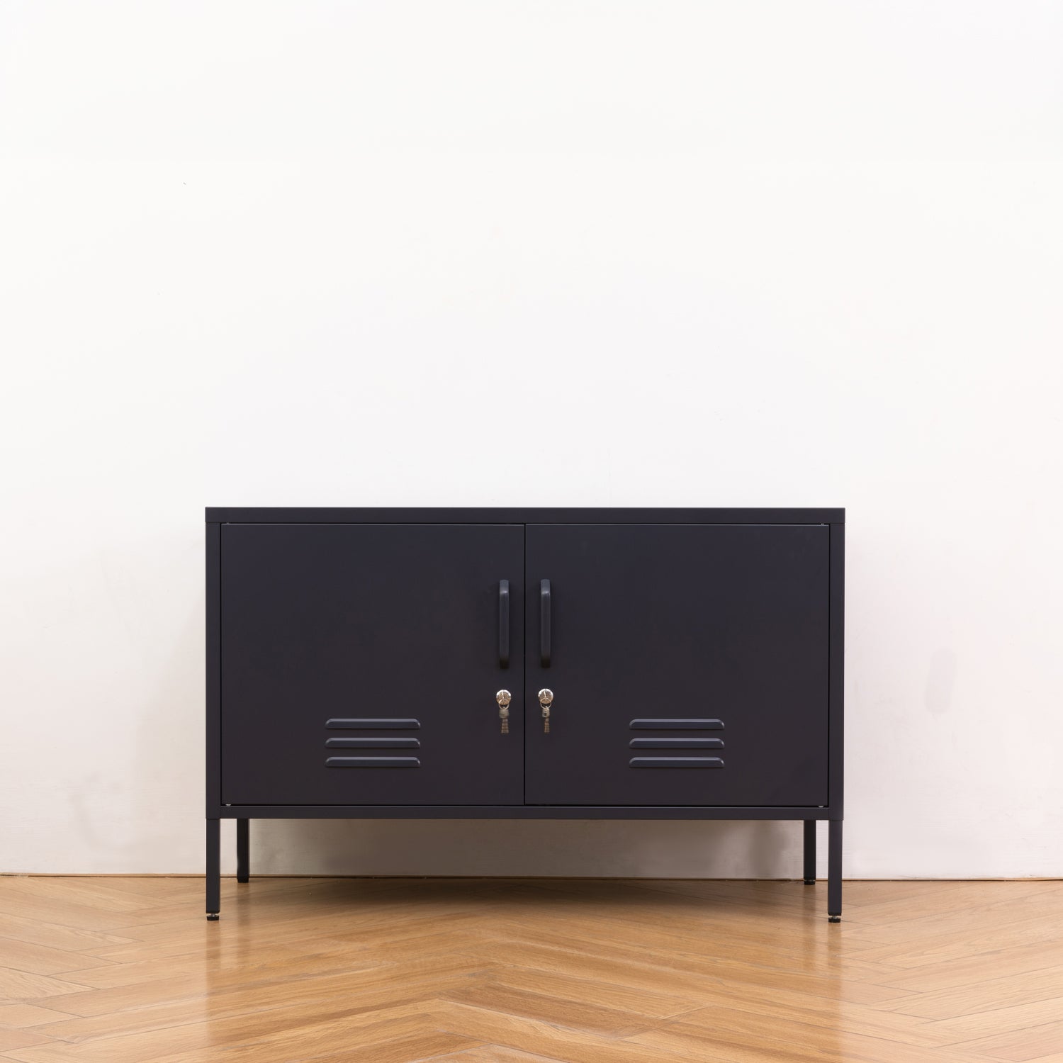 Design Republique Mila Low Locker Navy shown closed in a styled room setting with double doors, handles, locks and vent details.