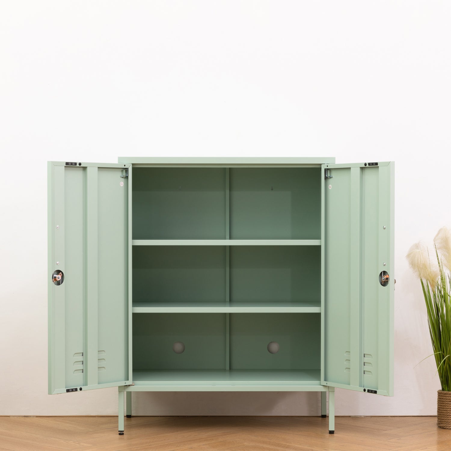 Design Republique Mila Sideboard Sage shown open with internal shelves and double-door access.