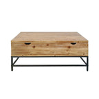 A rustic wooden coffee table with built-in storage drawers and a sturdy black metal frame combines practical functionality with industrial-inspired style.