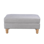 A generously sized neutral ottoman combines timeless style, plush comfort and natural wood legs, making it a versatile addition to any living space as a footrest, extra seat or coffee table alternative.