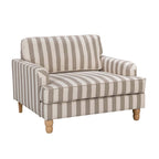 A generously sized striped armchair in soft neutral tones combines timeless style, plush comfort and natural wood legs to suit a range of classic and contemporary interiors.