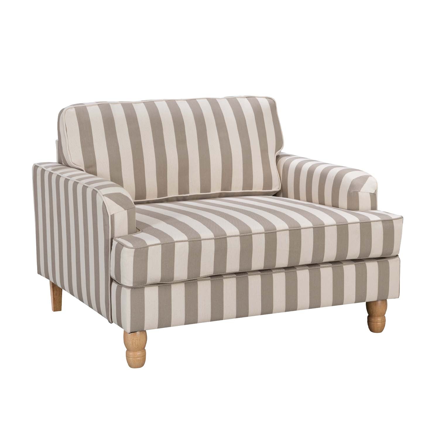 A generously sized striped armchair in soft neutral tones combines timeless style, plush comfort and natural wood legs to suit a range of classic and contemporary interiors.