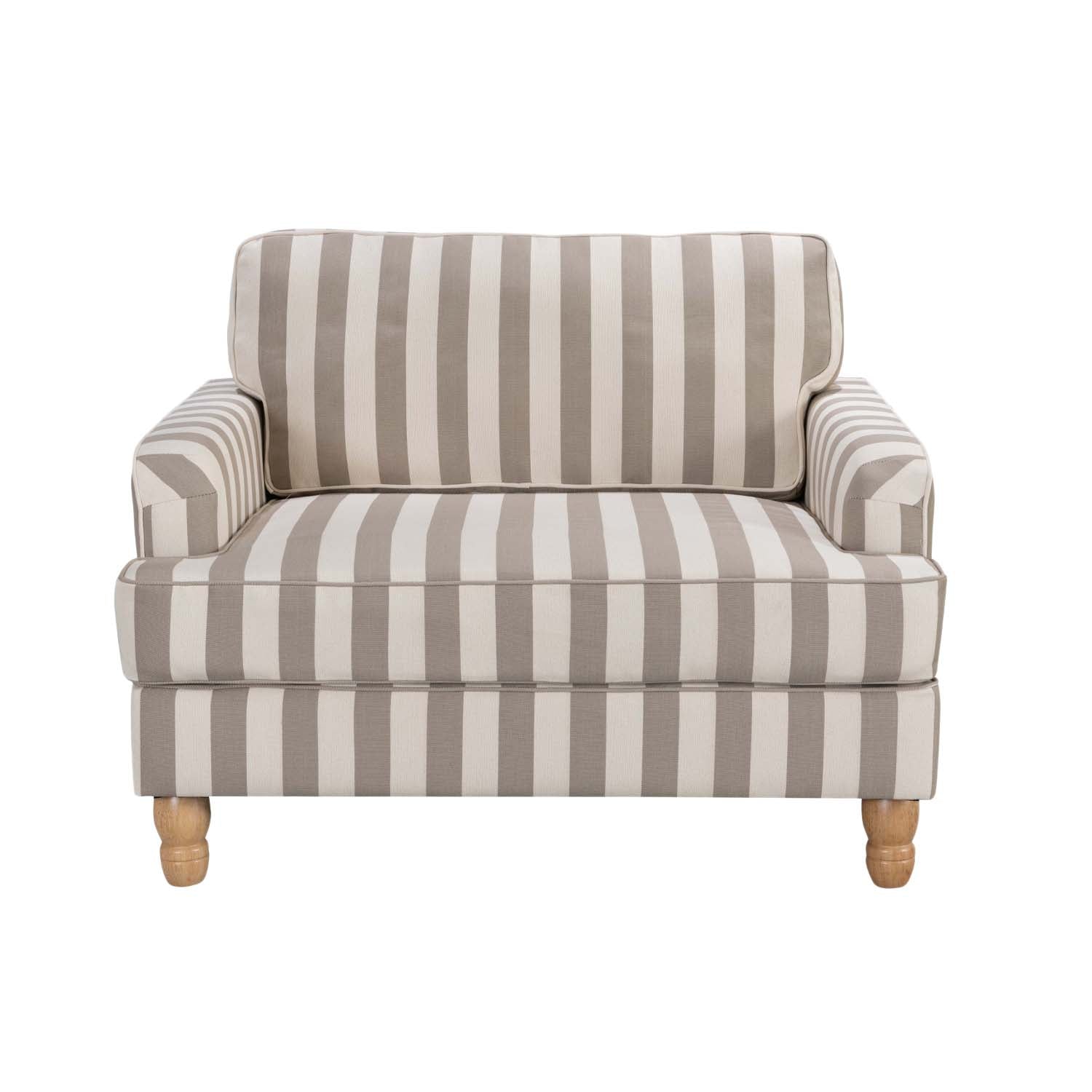 A generously sized striped armchair in soft neutral tones combines timeless style, plush comfort and natural wood legs to suit a range of classic and contemporary interiors.