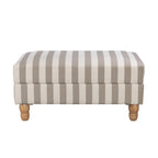 A classic striped ottoman in soft neutral tones combines timeless style, plush comfort and natural wood legs, making it a versatile addition to any living space as a footrest, extra seating or a coffee table alternative.
