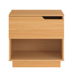 Front view of the Home Co. Davy Bedside Table in Natural, showing the single drawer, cut-out handle, open lower shelf and plinth base.