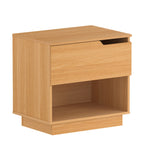 Home Co. Davy Bedside Table in Natural shown on a white background, featuring a single drawer, integrated cut-out handle and open lower shelf.