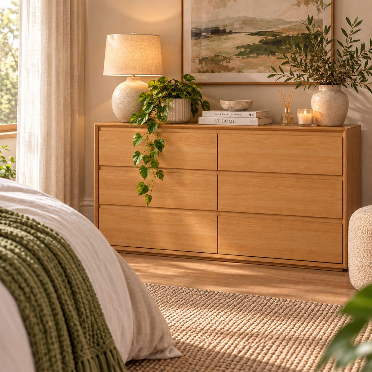 Home Co. Olsen 6 Drawer Dresser in Natural styled in a warm bedroom, featuring six spacious drawers and a clean wood-look finish.