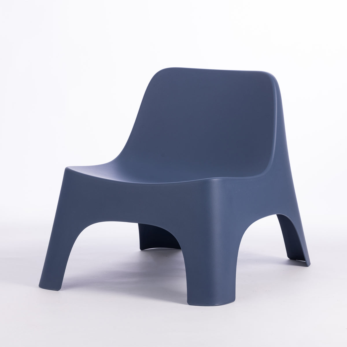 A modern moulded plastic chair in a navy blue colour.