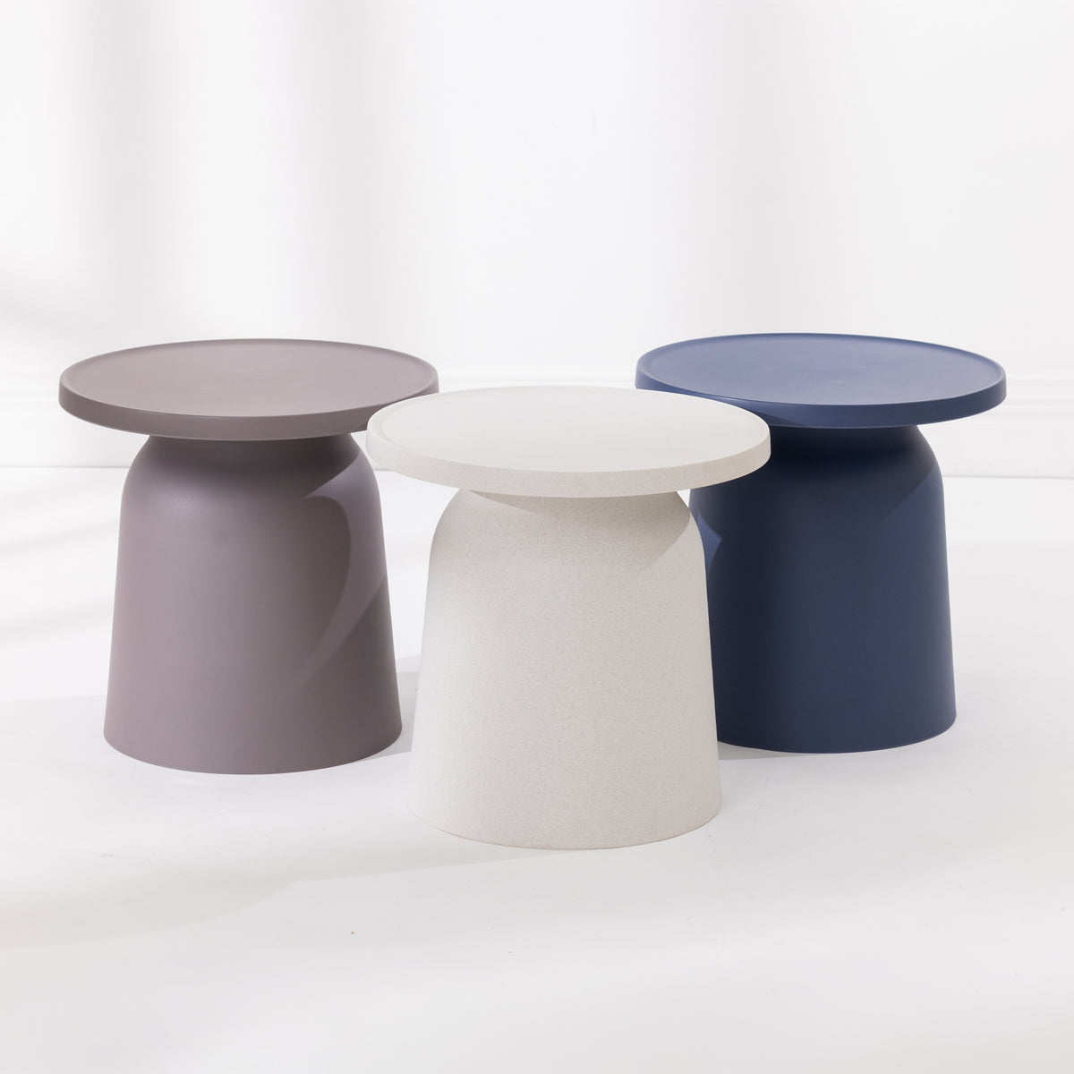 Three outdoor side tables.