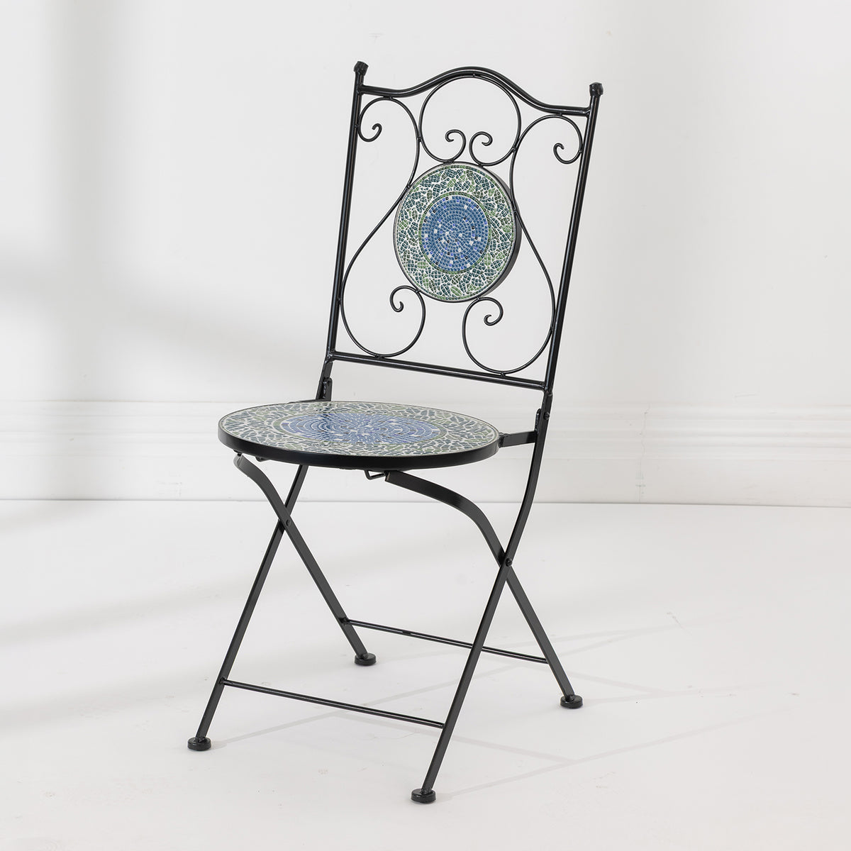 Outsidings Blue Tile Mosaic Chair shown at an angle, featuring a blue and green mosaic seat and decorative scrollwork frame.