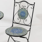 Close-up of the Outsidings Blue Tile Mosaic Chair showing the detailed blue and green mosaic seat, matching backrest and black metal scrollwork.