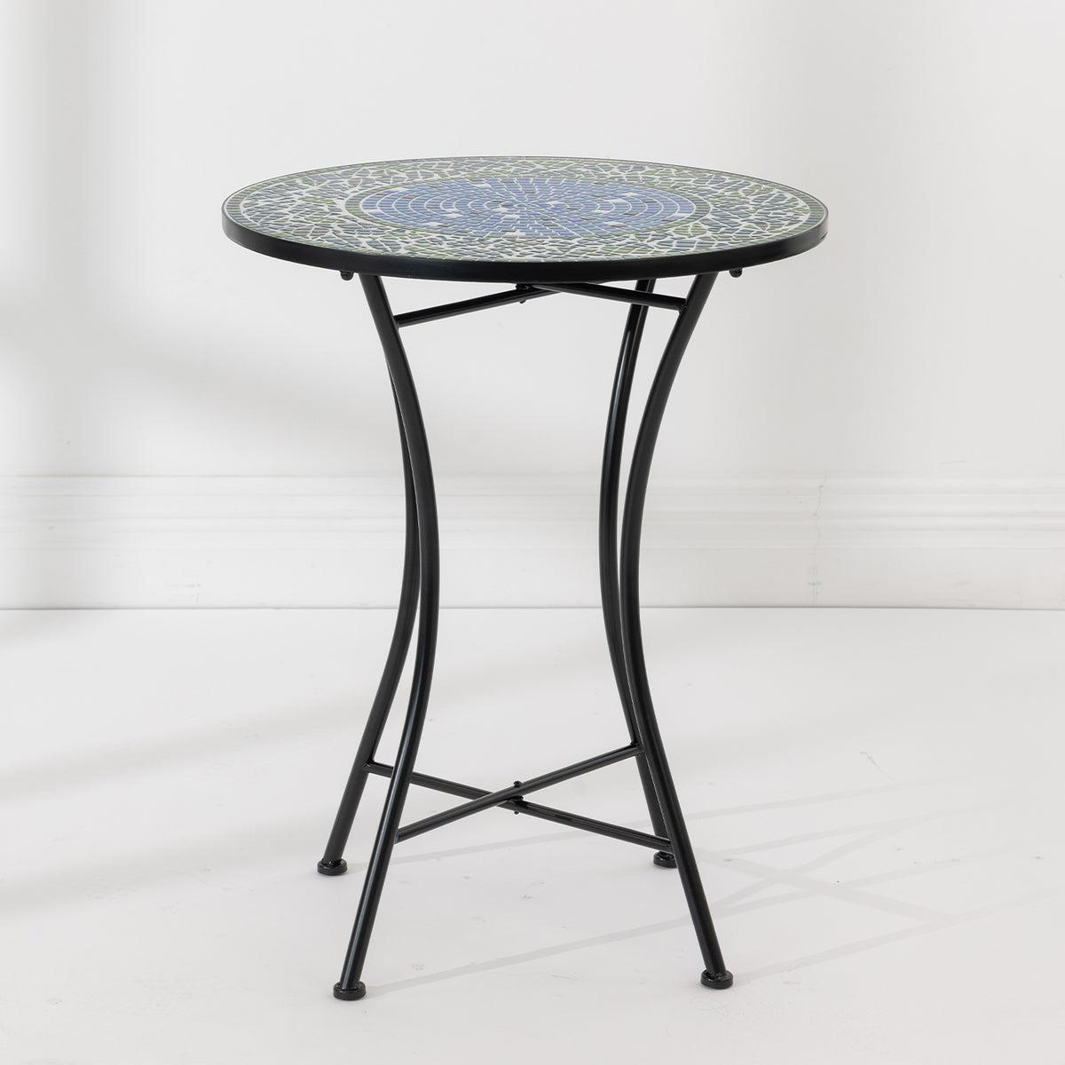Outsidings Blue Tile Mosaic Table featuring a round blue and green mosaic top with curved black metal legs.