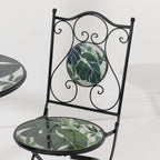 Close-up of the Outsidings Green Leaves Mosaic Chair showing the green leaf mosaic seat and decorative scrollwork backrest.