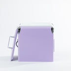 Lilac cooler box shown with the lid removed, revealing a spacious white insulated interior designed for storing chilled drinks, ice and refreshments.