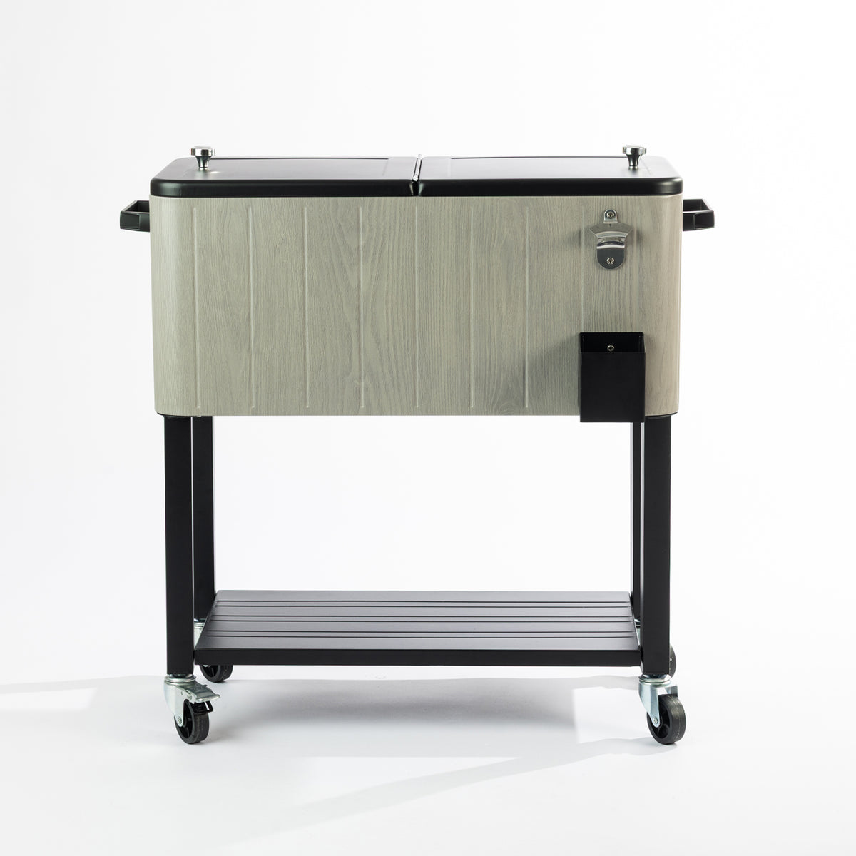 Grey wood-look 76L cooler box featuring a textured timber-effect exterior, black split lids with silver knobs, built-in bottle opener, side handles, bottle cap catcher, lower storage shelf and four caster wheels.