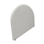 Angled view of the Design Plus Eve Arch Headboard in Cream, highlighting the curved shape, textured bouclé upholstery and slim profile.