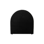 Rear view of the Cream Eve Arch Boucle Headboard showing the smooth black fabric backing, curved top and small supporting feet.